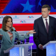 Former Colorado Governor John Hickenlooper watches Marianne Williamson speak at the first round of democratic debates for the 2020 presidential election.